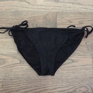 Full coverage black tie bikini bottoms